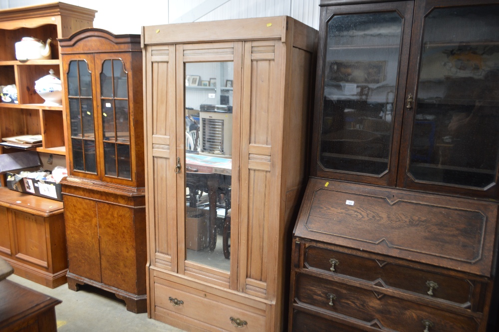 A satin wood Edwardian mirrored fronted wardrobe f