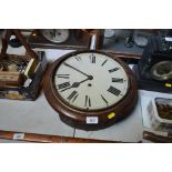 A late Victorian single hole wall clock