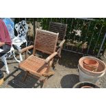 Two teak folding garden chairs