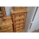 A pine chest fitted five drawers