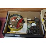 A box containing a Centerpin fishing reel and vari