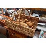 A wicker carrier; and a wicker basket and contents