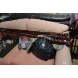 A quantity of curtain poles, rings and curtains