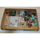 A tray of turquoise and other hardstone mounts