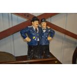 An ornament in the form of Laurel & Hardy
