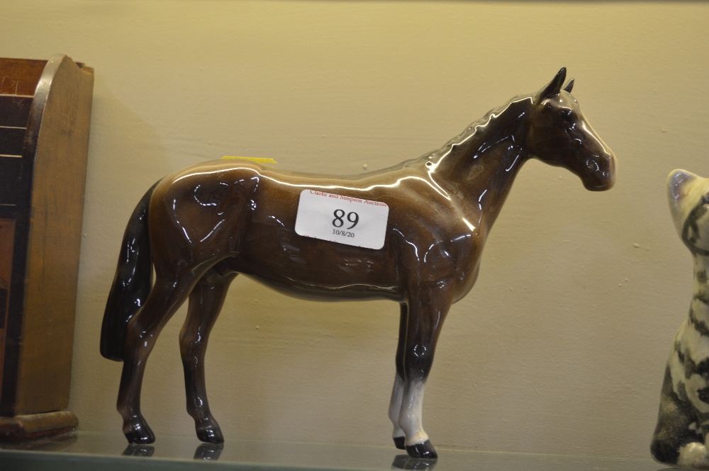 A Beswick brown glazed horse