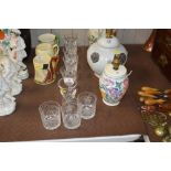 A quantity of wine glasses and three etched glass