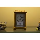 A brass cased carriage clock