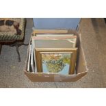 A box of various pictures and prints