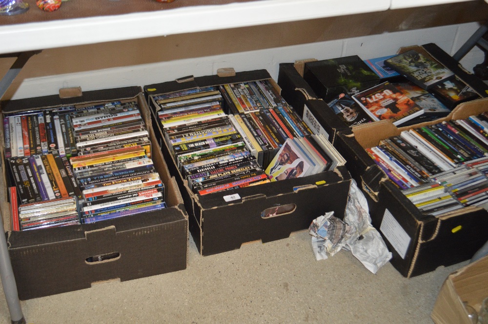 Four boxes of DVD's and CD's