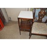 A 19th century mahogany two tier nightstand fitted