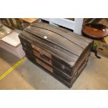 A metal and wooden bound trunk