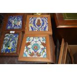 Two pine framed Art Nouveau ceramic tiles