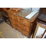 A good quality walnut chest fitted two short over