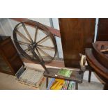 A 19th Century elm spinning wheel