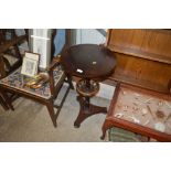 A Victorian rosewood circular topped table