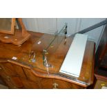 A 1950's clear glass bathroom shelf