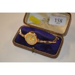 A ladies 9ct gold cased wrist watch