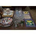 A set of six drinking glasses; a glass basket; Vic