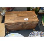 A 19th Century rosewood sarcophagus shaped tea cad