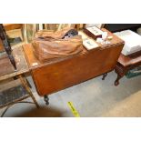 A 19th century mahogany drop leaf table