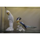 A Karl Ens model parrot; and a Portuguese pottery