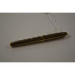 A Sheaffer gold plated pen