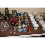 A collection of various glass paperweights to incl