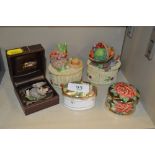 Four various novelty trinket boxes and covers; and