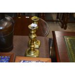 A pair of Victorian brass candlesticks