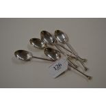 A set of six silver coffee spoons