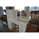 A dressing table set comprising of a two drawer ch