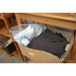 A box of various clothing to include suits and shi