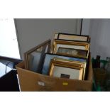 A box of various pictures and prints