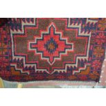 An approx. 4ft 2ins x 2ft 10ins Belouchi rug