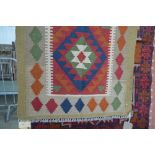 An approx. 4ft 2ins x 2ft 7ins Kelim rug