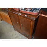 A reproduction mahogany t.v. cabinet, fitted singl