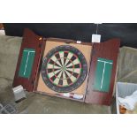 A dartboard in fitted case