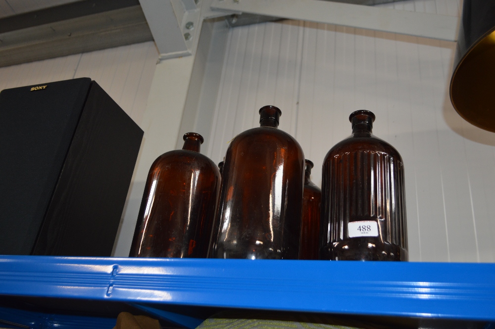 Six vintage chemist bottles