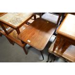 A mahogany tilt top table, raised on tripod base