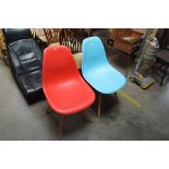 Two modern plastic chairs