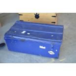 A blue painted trunk