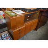 A 20th Century walnut cabinet with glass sliding d