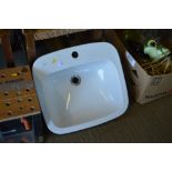 An Ideal Standard white glazed sink