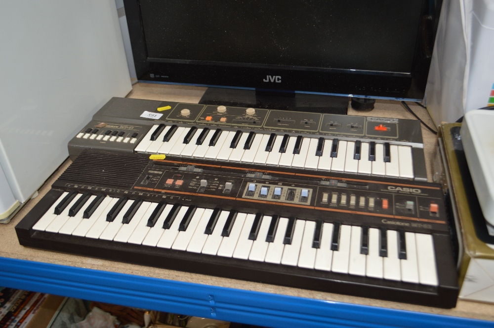 Two Casio keyboards lacking leads