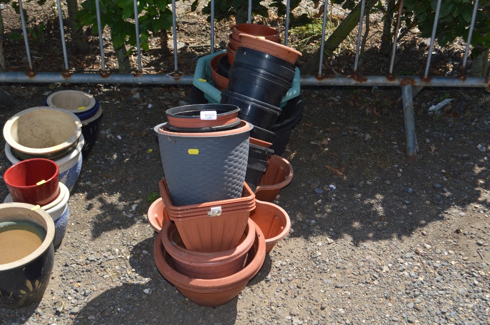 A quantity of plastic planters