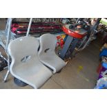 A bowling alley table and two chairs