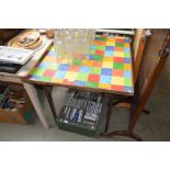 A folding card table