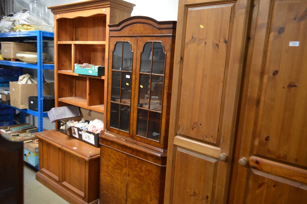 A walnut corner cabinet