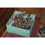 A box of various costume jewellery